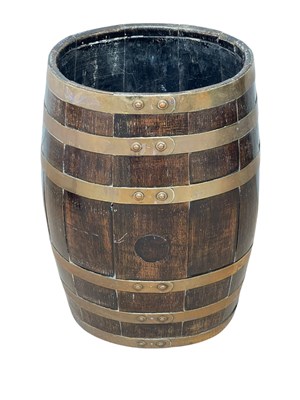 Lot 1256 - A coopered oak and brass bound barrel, height...