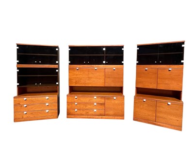 Lot 2315 - Three mid century teak modular wall units, the...