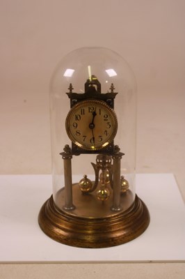 Lot 487 - A 1940s oak dome top mantel clock and an...