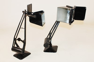 Lot 1239 - A pair of black painted vintage table lamps...