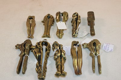 Lot 1034 - A group of brass nutcrackers, forms including...