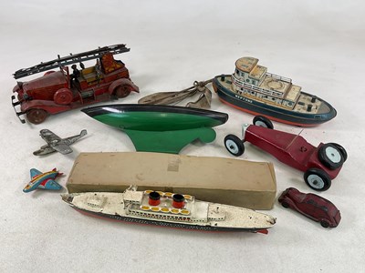 Lot 1088 - A group of vintage toys including a large...