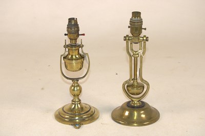 Lot 1233 - Two early 20th century brass ship's lamps,...