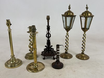 Lot 1244 - A pair of brass open twist table lamps with...