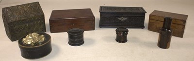 Lot 1027 - A collection of treen including a tea caddy...