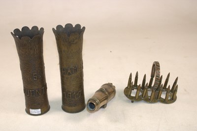 Lot 117 - A well detailed and large pair of Trench Art...