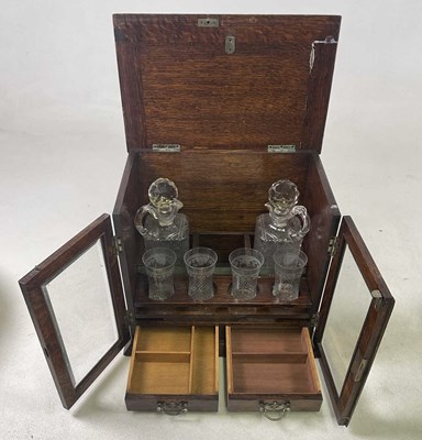 Lot 218 - An early to mid 20th century oak decanter box,...