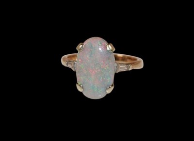 Lot 359 - A yellow metal opal and diamond ring, the...