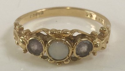 Lot 394 - A 14ct yellow gold opal dress ring, size P, 2.9g.
