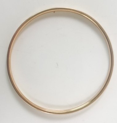 Lot 366 - A 9ct yellow gold bangle, internal diameter...