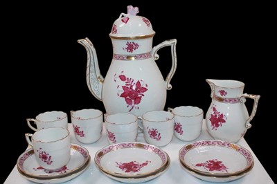 Lot 149 - HEREND; a puce and gilt decorated coffee set...