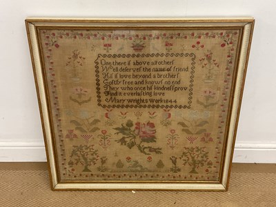 Lot 75 - A large mid 19th century sampler with...