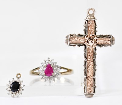 Lot 1034 - A 9ct yellow gold ring set with a pink...