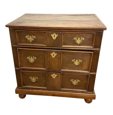 Lot 509 - A 17th century oak chest of three drawers,...