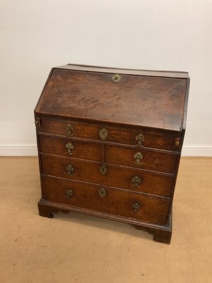 Lot 696 - A 17th century oak bureau of small proportions,...