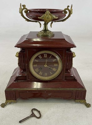 Lot 654 - A late 19th century French red marble gilt...