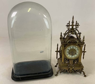 Lot 452 - A late 19th century French brass mantel clock,...
