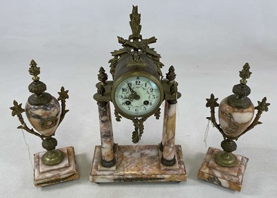 Lot 453 - A late 19th century French three piece clock...