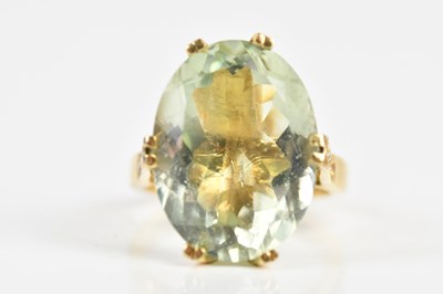 Lot 1592 - A yellow metal dress ring, stamped '750', set...