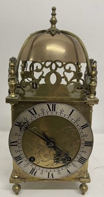 Lot 451 - A circa 1900 brass lantern clock, the eight...