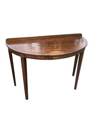 Lot 2182 - A mahogany D-end console table with...