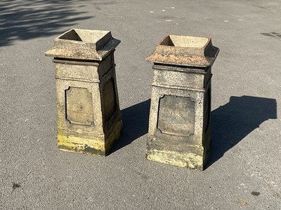 Lot 2337 - A pair of chimney pots, height 72cm.