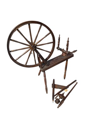 Lot 2277 - A pine provincial spinning wheel, height 100cm.