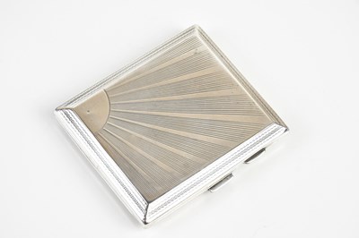 Lot 1535 - MPG; a George V hallmarked silver cigarette...