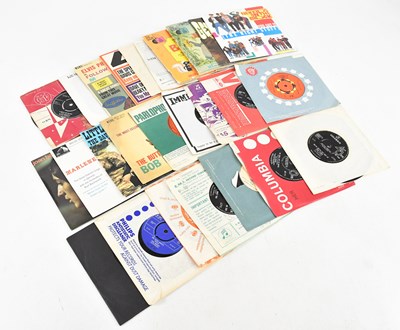 Lot 1217 - A collection of twenty six 7" singles, to...