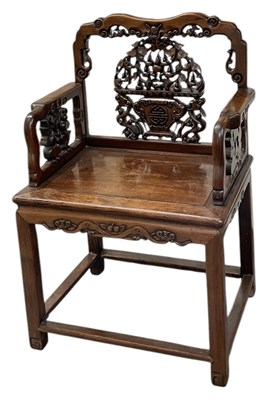 Lot 581 - A 19th century Chinese carved Huang Huali...
