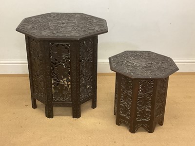 Lot 554 - Two graduated Anglo Indian hardwood carved and...