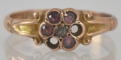 Lot 1201 - A 9ct yellow gold diamond and pink stone set...