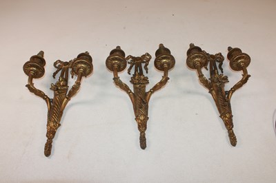 Lot 1207 - A set of three circa 1900 gilt metal twin...