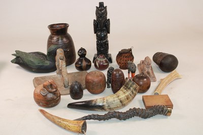 Lot 1054 - A group of treen, also a totem, height 35cm, a...