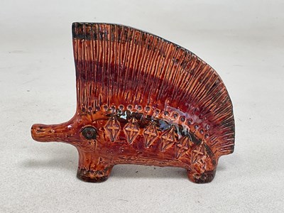 Lot 154 - ALDO LONDI FOR BITOSSI; a red and brown glazed...