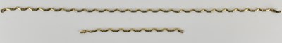 Lot 1214 - A 9ct gold semi-rigid angled link necklace...