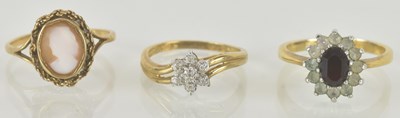 Lot 1192 - Two 9ct gold dress rings, one with bezel set...