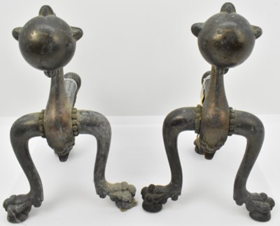 Lot 456 - A pair of Victorian bronzed metal fire dogs in...
