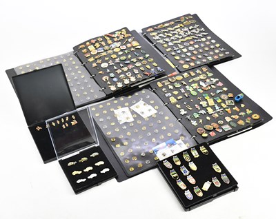 Lot 1344 - Three albums containing pin badges, including...