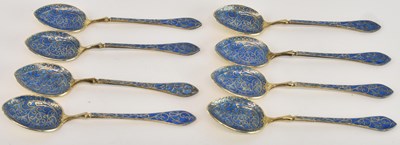 Lot 1068 - A set of eight 800 grade silver gilt blue...