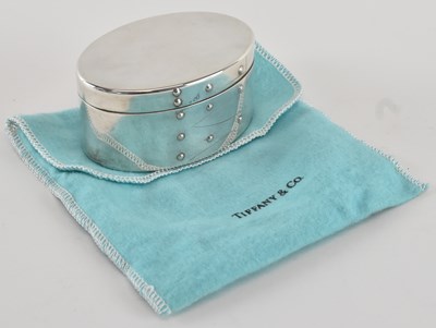 Lot 1069 - TIFFANY & CO; a modern sterling silver oval...