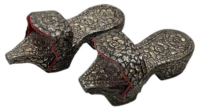 Lot 1103 - A pair of white metal overlaid miniature harem...