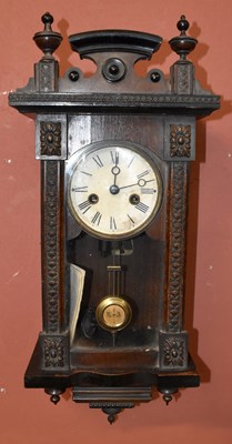 Lot 1507 - An early 20th century stained beech Vienna style wall clock