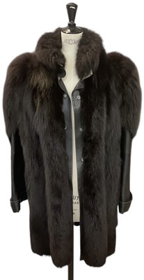 Lot 439 - YOUR SIXTH SENSE; a vintage black leather and...