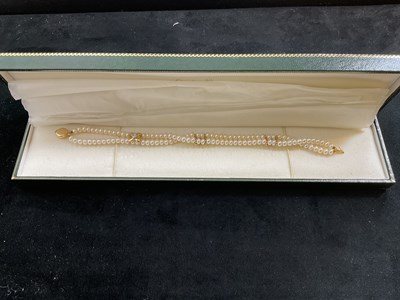 Lot 513 - A 14ct yellow gold diamond and cultured pearl...