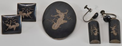 Lot 1337 - A suite of Thai Siam sterling silver niello...