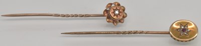 Lot 1292 - A 15ct yellow gold ruby and diamond set stick...