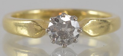 Lot 1156 - An 18ct yellow gold diamond solitaire ring,...