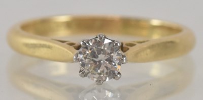 Lot 1164 - An 18ct yellow gold and platinum diamond...