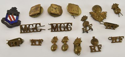 Lot 376 - A small collection of assorted military cap...